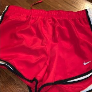 Red Nike shorts